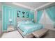 Main bedroom with a plush bed and elegant decor at 2937 Hooded Crane Cv, Harmony, FL 34773