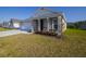 One story home with front porch and landscaping at 2937 Hooded Crane Cv, Harmony, FL 34773