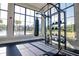 Strength training area with rack and heavy bag at 2937 Hooded Crane Cv, Harmony, FL 34773