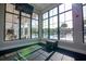 Fitness center with window view of pool and lounge area at 2937 Hooded Crane Cv, Harmony, FL 34773