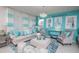 Elegant living room with Tiffany & Co decor and comfy seating at 2937 Hooded Crane Cv, Harmony, FL 34773