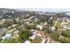 Wide aerial showcasing home, neighborhood, and waterfront access at 310 Florida Ave, Saint Cloud, FL 34769