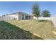 Large backyard with home and tree visible at 321 Briarbrook Ln, Haines City, FL 33844