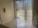 Kitchen nook with access to backyard patio at 34 Pine Island Cir, Kissimmee, FL 34743