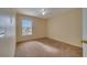 Bright bedroom with neutral walls and carpet flooring at 356 Aylesbury Ct, Kissimmee, FL 34758