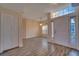 Bright and airy entryway with tile flooring and a view to the living room at 356 Aylesbury Ct, Kissimmee, FL 34758