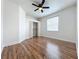 Light bedroom, featuring wood-look flooring and closet at 3718 Winners Ct, Gotha, FL 34734