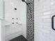 Walk-in shower with subway tile and mosaic accents at 3718 Winners Ct, Gotha, FL 34734