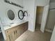 Main bathroom with double vanity and walk-in shower at 449 Heather Hill Blvd, Davenport, FL 33837