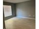 Simple bedroom with tile floor and window with blinds at 449 Heather Hill Blvd, Davenport, FL 33837