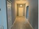 Bright entryway with light-colored tile flooring and neutral walls at 449 Heather Hill Blvd, Davenport, FL 33837