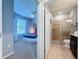 Bedroom with floral wall and ensuite bathroom at 4626 Terrasonesta Dr, Davenport, FL 33837