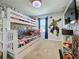 Themed bedroom with bunk beds and Marvel comics wallpaper at 4626 Terrasonesta Dr, Davenport, FL 33837