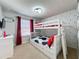 Mickey Mouse themed bedroom with bunk beds and red accents at 4626 Terrasonesta Dr, Davenport, FL 33837