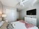 Bedroom with a queen bed and built-in dresser at 4626 Terrasonesta Dr, Davenport, FL 33837