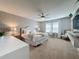 Main bedroom with a king-size bed and ensuite bathroom at 4626 Terrasonesta Dr, Davenport, FL 33837