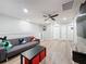 Fun-themed game room with Mickey Mouse decor and large TV, perfect for  at 4626 Terrasonesta Dr, Davenport, FL 33837