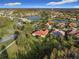 Luxury home nestled in a community with a lake and golf course nearby at 542 Viterra Ct, Kissimmee, FL 34759