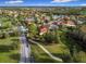 Luxury home nestled in a community with a lake and golf course nearby at 542 Viterra Ct, Kissimmee, FL 34759