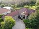 One-story home with tile roof, driveway, and landscaped yard; located in a quiet community at 542 Viterra Ct, Kissimmee, FL 34759