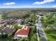 Luxury community with tree-lined streets and beautifully landscaped homes at 542 Viterra Ct, Kissimmee, FL 34759