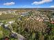 Luxury home nestled in a community with a lake and golf course nearby at 542 Viterra Ct, Kissimmee, FL 34759