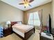 Cozy bedroom with a full-size bed, and plenty of closet space at 542 Viterra Ct, Kissimmee, FL 34759