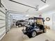 Spacious garage with ample room for two cars and golf cart at 542 Viterra Ct, Kissimmee, FL 34759