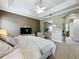 Main bedroom with walk-in closet and access to bathroom at 542 Viterra Ct, Kissimmee, FL 34759