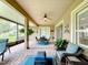 Relaxing screened patio with seating area, perfect for outdoor enjoyment at 542 Viterra Ct, Kissimmee, FL 34759
