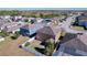 Aerial view of home and surrounding neighborhood, near a lake at 627 Lucerne Blvd, Winter Haven, FL 33881