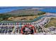 Aerial view of home near a large lake at 627 Lucerne Blvd, Winter Haven, FL 33881