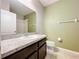 Simple bathroom with shower and vanity at 627 Lucerne Blvd, Winter Haven, FL 33881