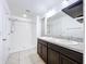 Modern bathroom with double vanity, granite countertop, and shower at 627 Lucerne Blvd, Winter Haven, FL 33881