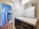 Small bathroom with single sink and vanity at 627 Lucerne Blvd, Winter Haven, FL 33881