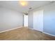 Simple bedroom with a double-door closet at 627 Lucerne Blvd, Winter Haven, FL 33881