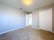 Bright bedroom featuring a double door closet at 627 Lucerne Blvd, Winter Haven, FL 33881