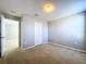 Spacious bedroom with neutral walls and carpet at 627 Lucerne Blvd, Winter Haven, FL 33881