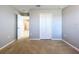 Well-lit bedroom with access to another room at 627 Lucerne Blvd, Winter Haven, FL 33881