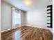 Spacious bedroom with wood floors and a window at 627 Lucerne Blvd, Winter Haven, FL 33881