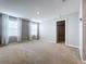 Spacious bedroom with two windows and neutral walls at 627 Lucerne Blvd, Winter Haven, FL 33881