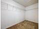 Large walk-in closet with wire shelving for storage at 627 Lucerne Blvd, Winter Haven, FL 33881