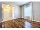 Bright entryway with wood-look floors and coat hook at 627 Lucerne Blvd, Winter Haven, FL 33881