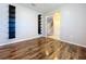 Bright hallway with wood floors and built-in shelving at 627 Lucerne Blvd, Winter Haven, FL 33881