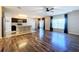 Kitchen with island, stainless steel appliances, and wood-look floors at 627 Lucerne Blvd, Winter Haven, FL 33881