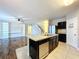 Modern kitchen with stainless steel appliances and an island at 627 Lucerne Blvd, Winter Haven, FL 33881
