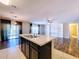 Modern kitchen with stainless steel appliances and an island at 627 Lucerne Blvd, Winter Haven, FL 33881