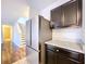 Stainless steel appliances and granite countertops in this kitchen at 627 Lucerne Blvd, Winter Haven, FL 33881