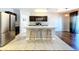 Updated kitchen with stainless steel appliances and breakfast bar at 627 Lucerne Blvd, Winter Haven, FL 33881