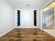 Bright room with built-in shelving and wood-look floors at 627 Lucerne Blvd, Winter Haven, FL 33881